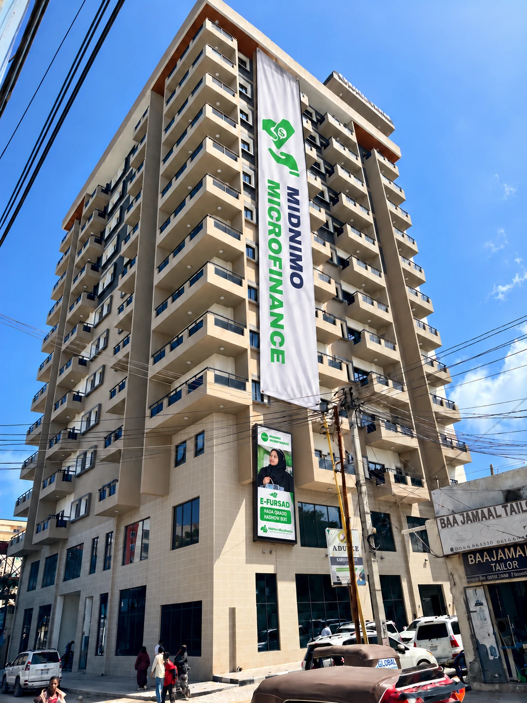 Daytime branding concept for the Midnimo Microfinance Mogadishu office at Orfane Tower